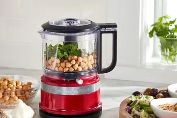 KitchenAid food processor on a kitchen countertop.