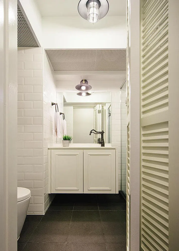 Go for an all-white design, and include texture through subway tiles and louvre doors. Interior Design by The Scientist