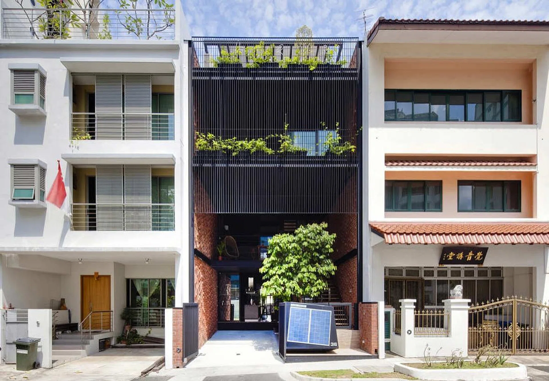 Principal architect Jaye Tan designed it to fit the tropical climate of Singapore, using passive architectural design and incorporating energy-efficient systems in the house.
