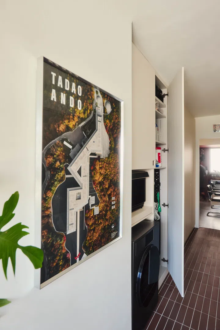 A Tadao Ando poster hints at Weilun’s long-standing love of architecture, an interest he now gets to explore through his own home.