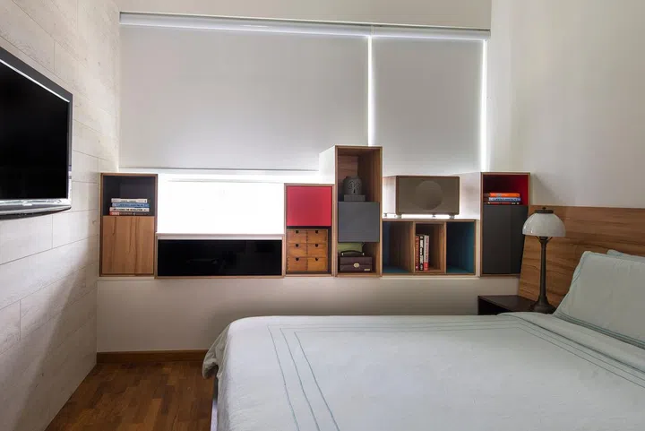 Uneven cabinet storage cabinets at bay window area of this condominium unit at The Calrose. Interior design by Story Of Us.