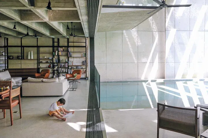 Light and shadow animate the surfaces throughout the day in the Chempenai House, Kuala Lumpur.