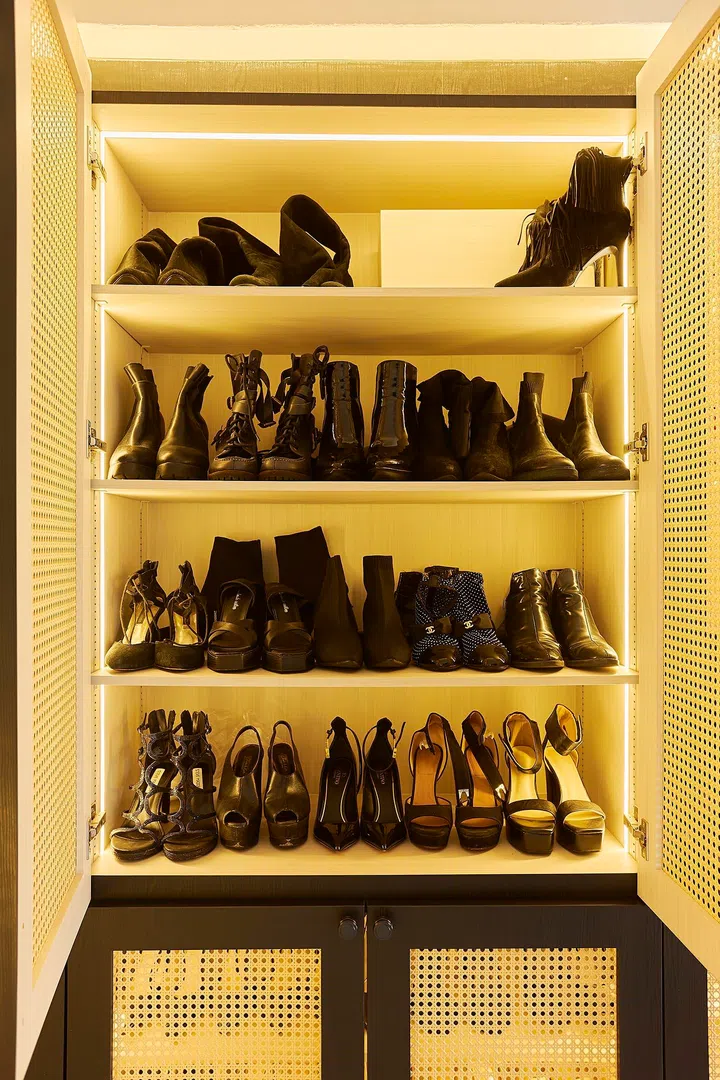 Shoe cabinets by the main entrance in a 3-bedroom condo (1,800 sq ft) in Pandan Valley, designed by Insight.Out Studio.