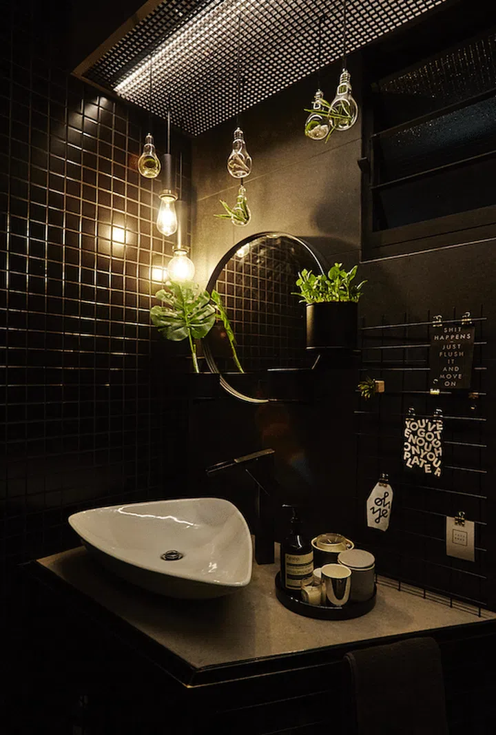 Homeowner Sherlynn also designed an angular vanity (instead of a long rectangular one) in one of the bathrooms to save on countertop space.