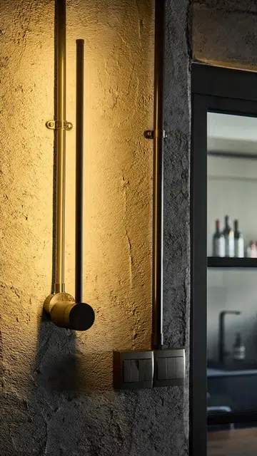 Close up of linear LED wall lamps in flight attendant Kenny Shoo’s 3-room HDB flat at Tampines Street 41.