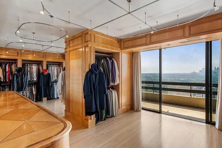 The walk-in closet has its own balcony.