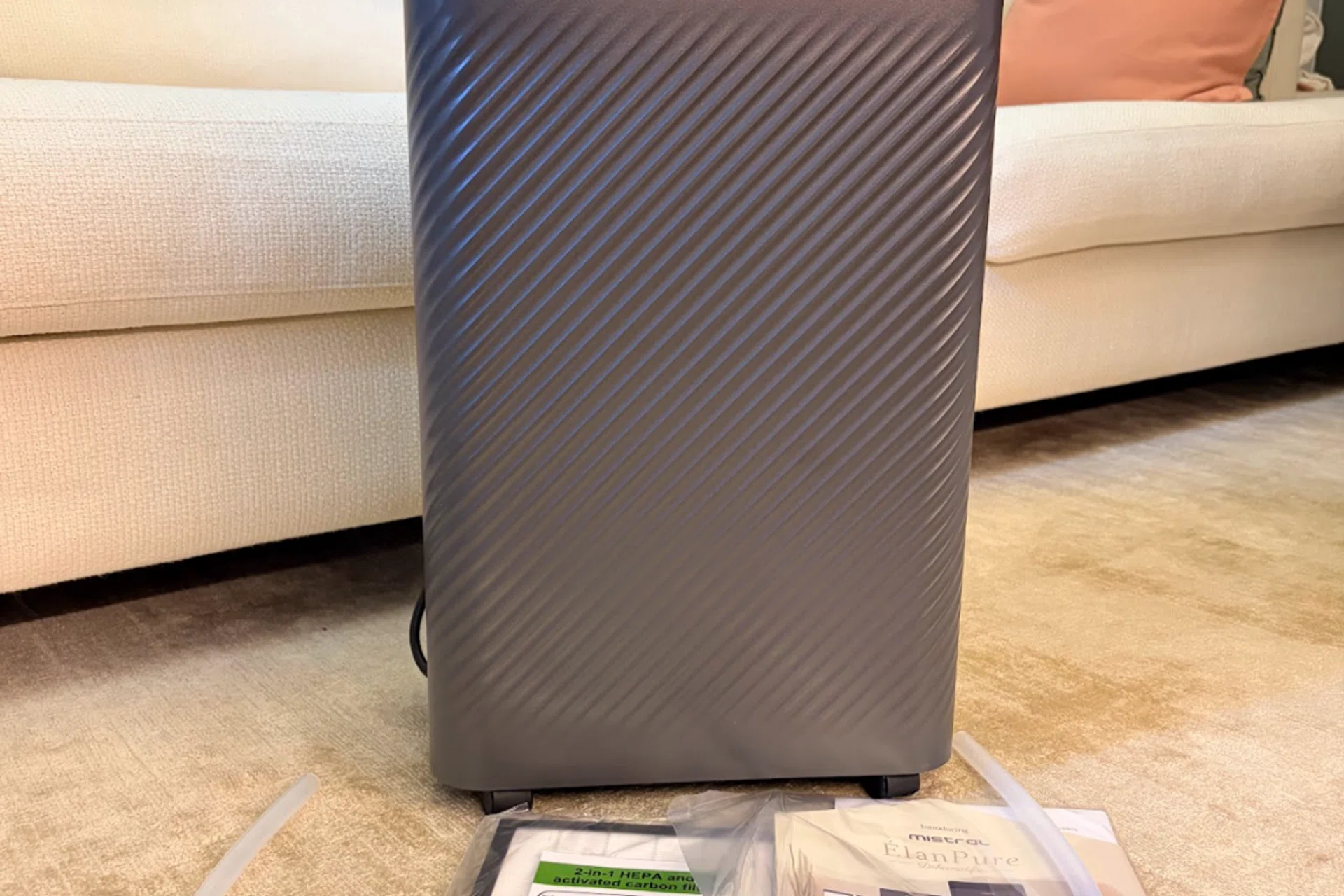 Mistral ÉlanPure 5-in-1 Smart Dehumidifier & Air Purifier (product code number MDH1603DW) comes with a continuous draining pipe, HEPA filter, and mobile app setup instructions.
