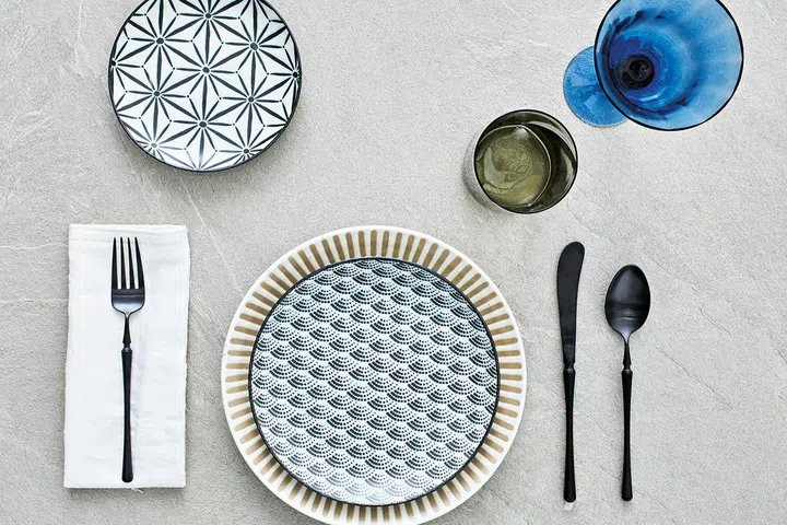 Awasaka start dessert Plate, $12.90, Awasaka waves salad plate, $15.90; Brown plate, $28.90; Matt black cutlery, $10.90 each, all from Lovera Collections.