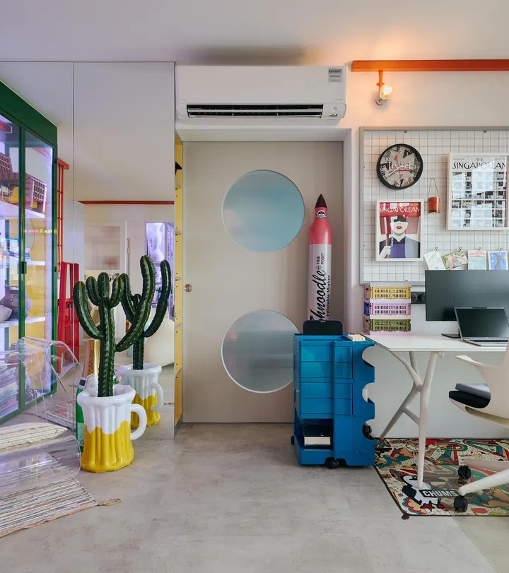 Instead of hiding the trunking, it's been made into a design feature running through the home. 