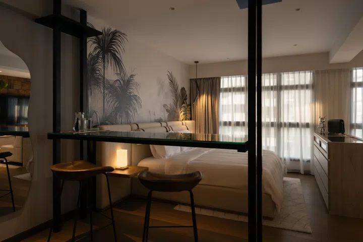 With minimal storage needs, Mr Lin could opt for low furniture and a light, uncluttered layout that keeps views clear across the room.