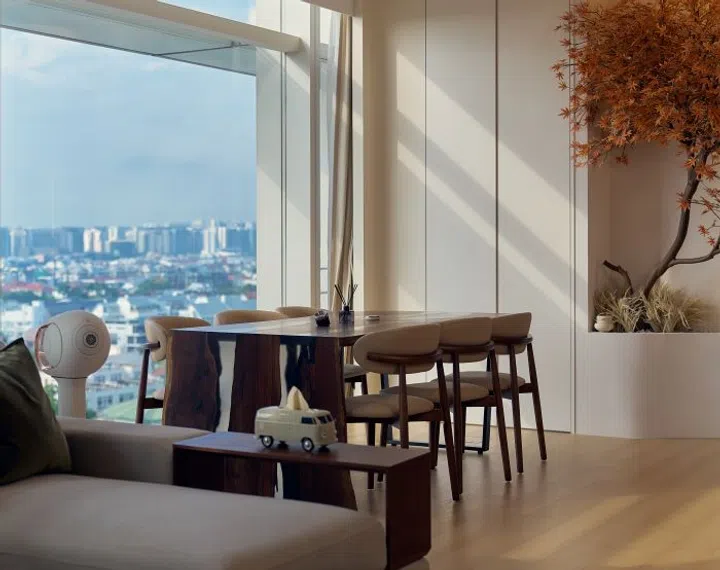 Ryan has always been a fan of Gray and Sanders’ furniture. Here, an American walnut table with epoxy inlays rests in front of the window with a scenic view. 