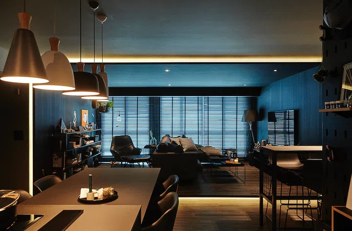 An oversized alcove built into the living room which homeowner Sherlynn, also the founder of interior design firm Millimeters Studio, cladded entirely in dark finishes.