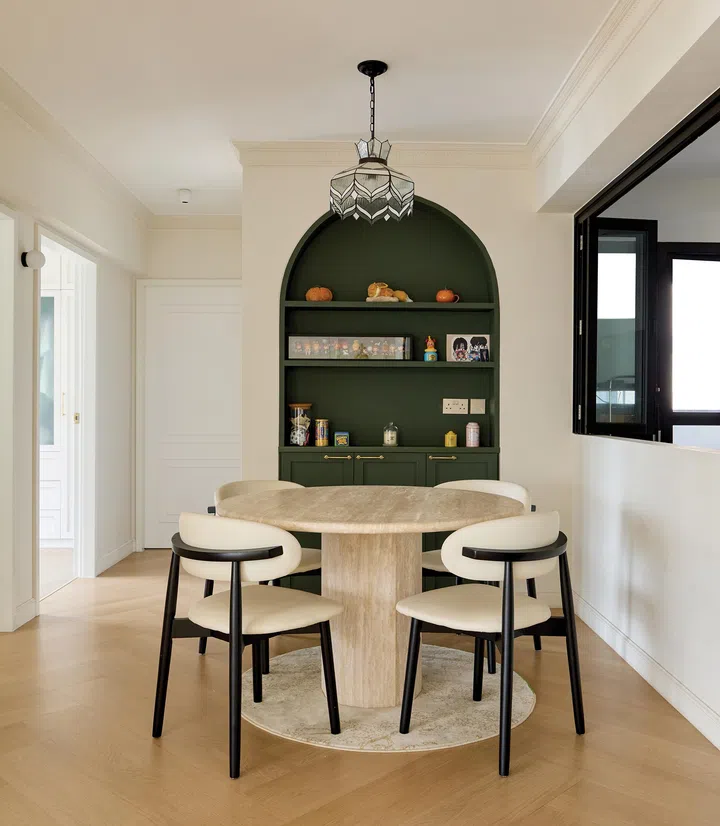 The marble dining table is certainly a statement piece.