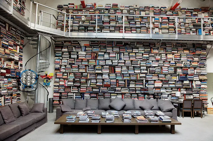 Karl Lagerfeld's home is covered in books from his extensive collection