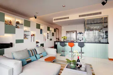 Living room in a family of four's condominium in Marine Parade. $100,000 Renovation by interior designer Lisa Ng from Ansana.