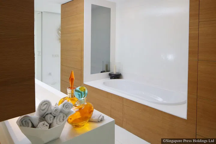 The luxurious master bathroom in British luxury furniture designer Christopher Guy Harrison's three-bedroom apartment in High Street Centre.