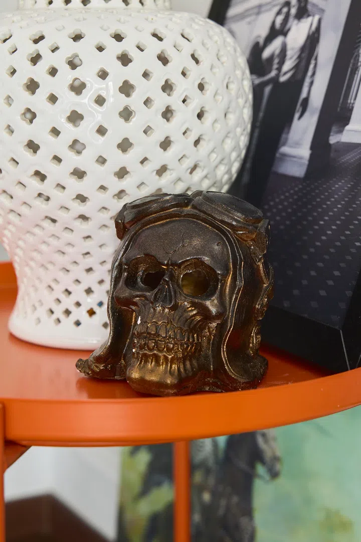 Skull motifs appear subtly throughout the home, a nod to the couple’s interest in gothic and punk influences.