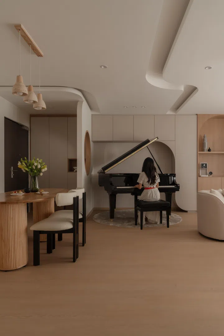 Designed to support both teaching and family life, the piano area balances acoustic performance, circulation space, and visual flow.