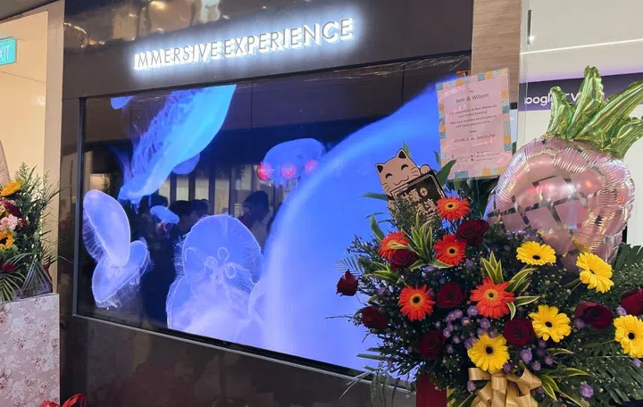 A TCL 98-inch mini-LED TV on display at the TCL Singapore Northpoint showroom.