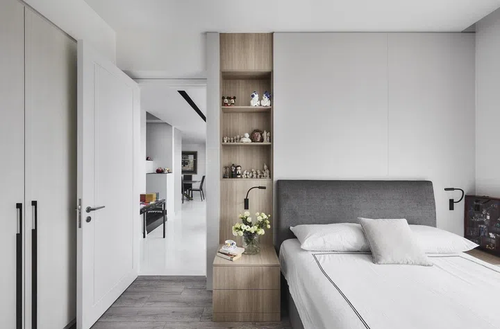 The master bedroom was relocated to the main floor in this 2-storey penthouse in Bukit Timah for a retired couple.