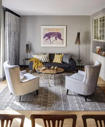 Designed by Sigmar, a London-based interior design firm, the home is a balance between contemporary furnishings and industrial and vintage detailing.