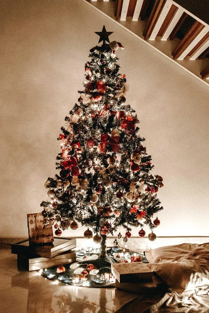 Christmas Lights on a Christmas Tree under a staircase