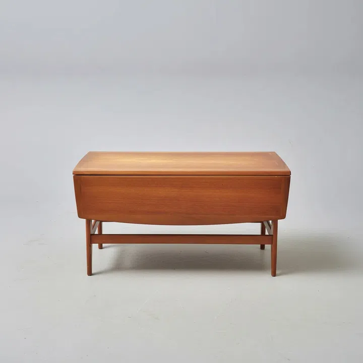 Antique: $1,200. Rare Stonehill Mid-Century Extendable Teak Coffee Table from The British Antique Company.