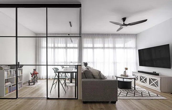 A farmhouse style living room with study tables
