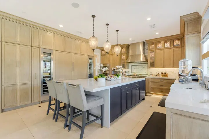 The chef's kitchen is classy and spacious.