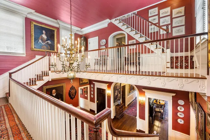 Gorgeous period staircases connect the two-and-a-half stories.