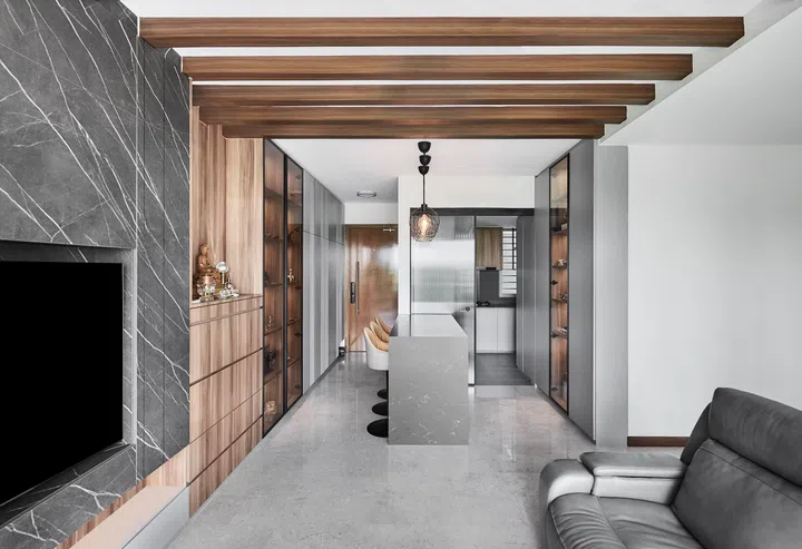 Living room within a 3 plus 1 bedroom apartment in Waterfront Key condominium along Bedok Reservoir Road.