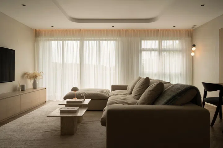 The warm and inviting living room with lots of natural light. 