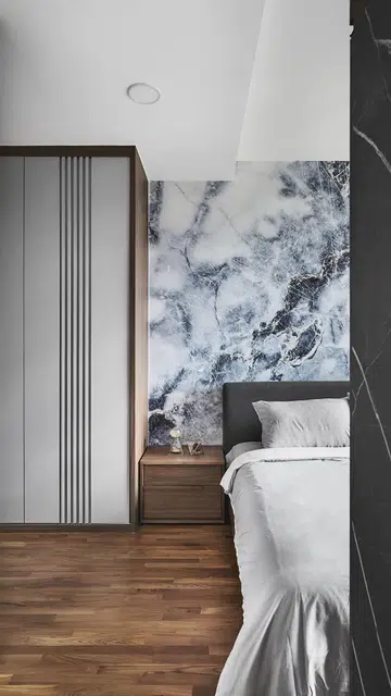 Marble print wallpaper in the master bedroom in a 3 plus 1 bedroom apartment in Waterfront Key condominium along Bedok Reservoir Road.