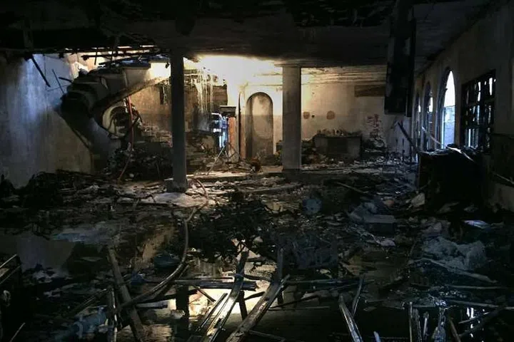 The charred remains of the house off Yio Chu Kang Road, after a fire last June that killed two people. PHOTO: SINGAPORE CIVIL DEFENCE FORCE