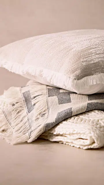 Throws, all from Ikea. Cushion, from Spotlight.