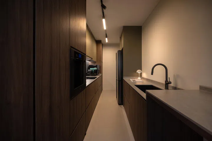 The kitchen cleverly conceals all appliances for a clean look. 