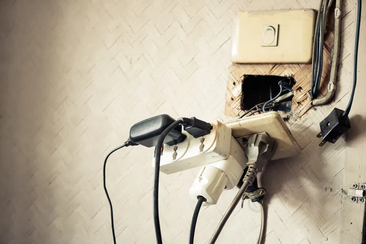Too many plugs in a socket / Danger of using too much electricity with copy space to add text