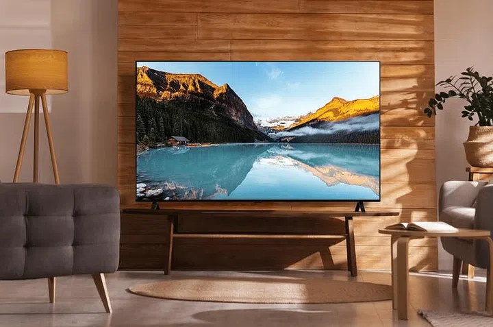 LG OLED TV Large Screen mounted on a wall in a living room