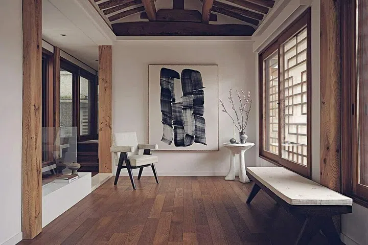Gyedong Residence - The living room in Teo Yang's hanok is adorned with artwork by Korean artist Lee Bae. This is one of Yang's newest and favourite pieces.