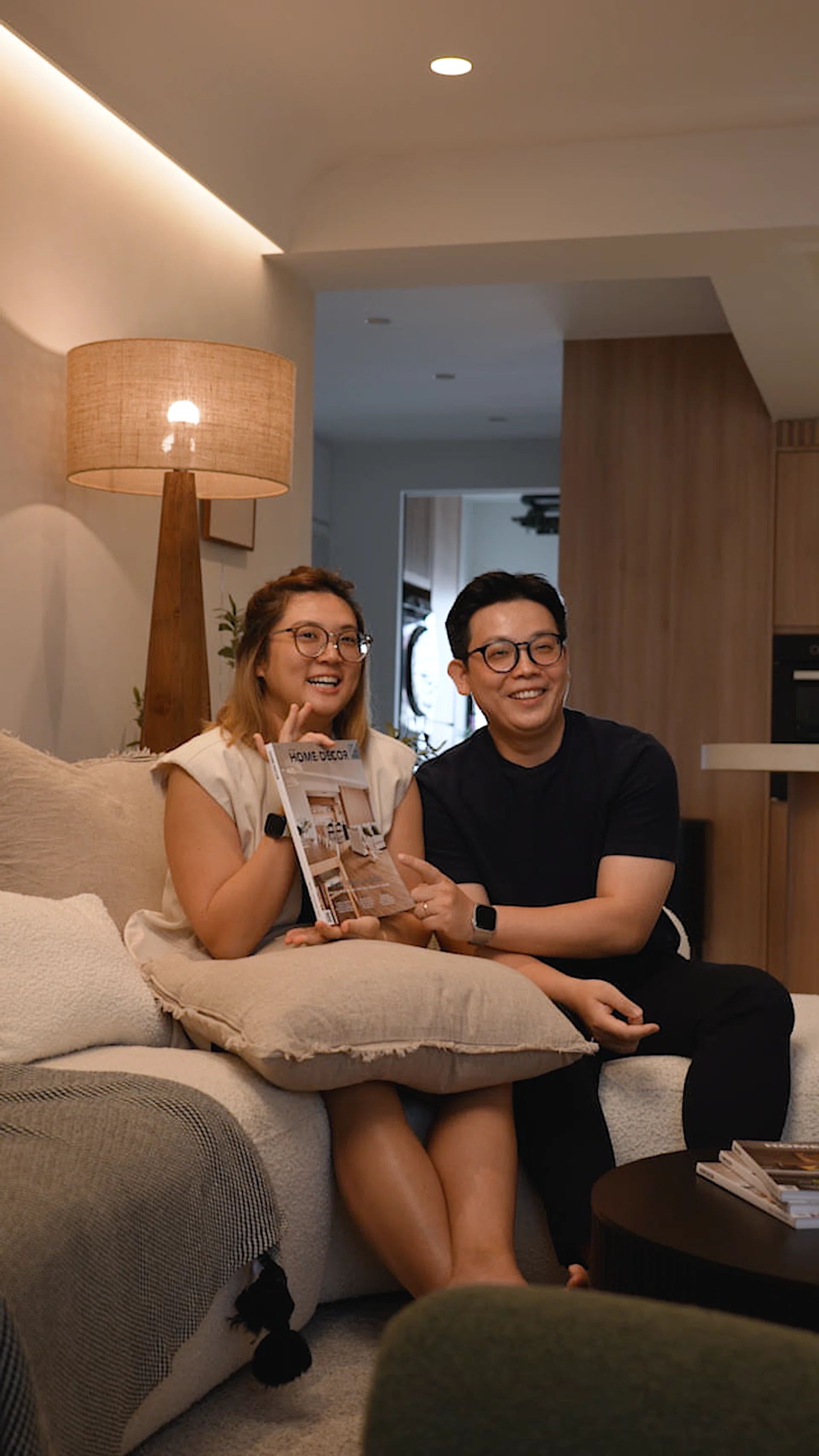 Interior designer Cedrick Law and wife Chua Tse Lyn poses for a picture in their 4-room HDB resale flat in Bedok.