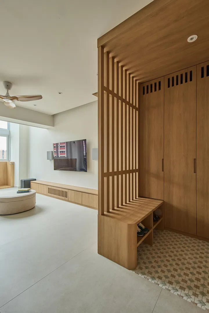 The foyer entrance flows into the living room.