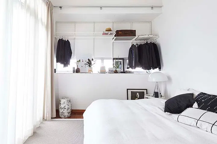 The black and white decor pieces in Mike's bedroom help to anchor the look of the space while making it feel cosier and more inviting as well.
