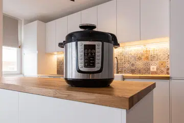 Modern multi cooker in kitchen