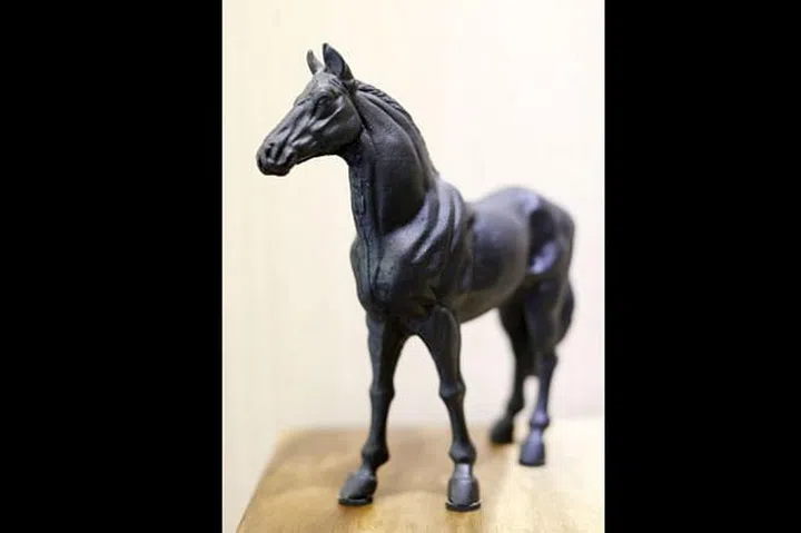 A treasured item is a cast iron sculpture of a horse, a birthday present from his kids.