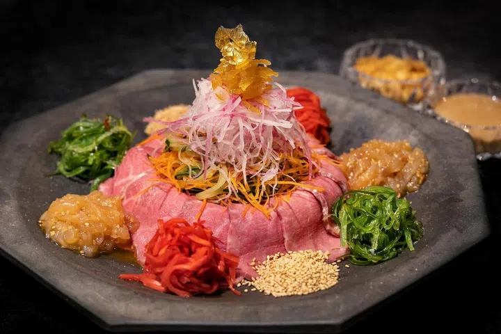 Chinese new year, Lunar new year, Yusheng, Yu Sheng, Lohei, Reunion dinner, Chinese restaurants, Year of the Snake