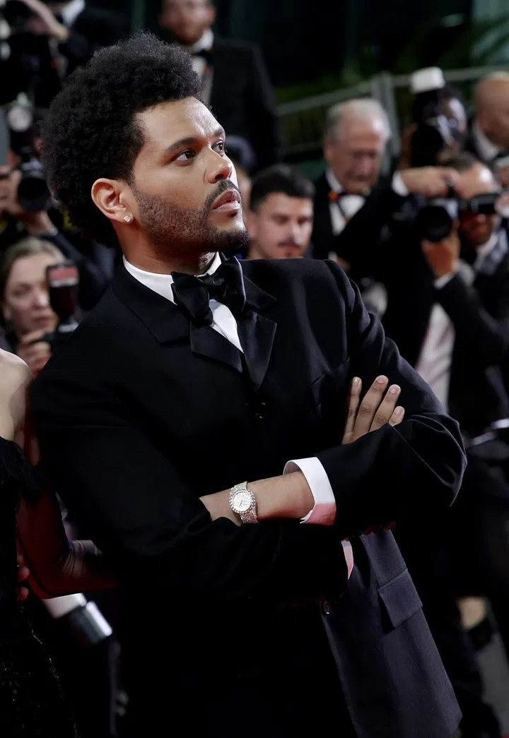 CANNES, FRANCE - MAY 22: (L-R) Sam Levinson, Lily-Rose Depp and Abel “The Weeknd” Tesfaye attend the "The Idol" red carpet during the 76th annual Cannes film festival at Palais des Festivals on May 22, 2023 in Cannes, France. (Photo by Pascal Le Segretain/Getty Images)