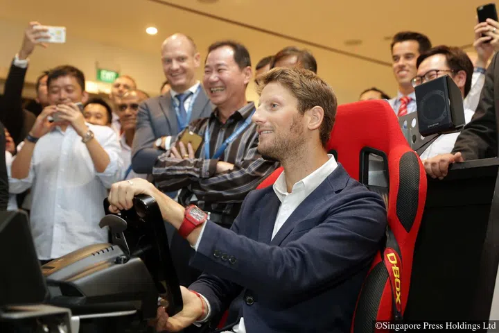 [NOTE: F1 photos are for editorial use only and NOT for sale] Haas driver Romain Grosjean in an F1 simulator at a Saxo Capital Markets and Jaguar Land Rover event on 14 September 2016.