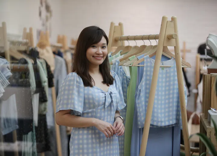 Y21 founder Jarenis Ho is steering the brand from travel-themed collections to cosy, comfortable separates, knitwear and more single-toned basics. She is pictured at the Suntec City outlet.