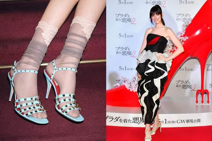 The new Valentino Garavani Rockstud heels blend strength, class and elegance; Hollywood star Anne Hathaway stuns in the Rockstud white version at The Devil Wears Prada 2 Tokyo premiere.