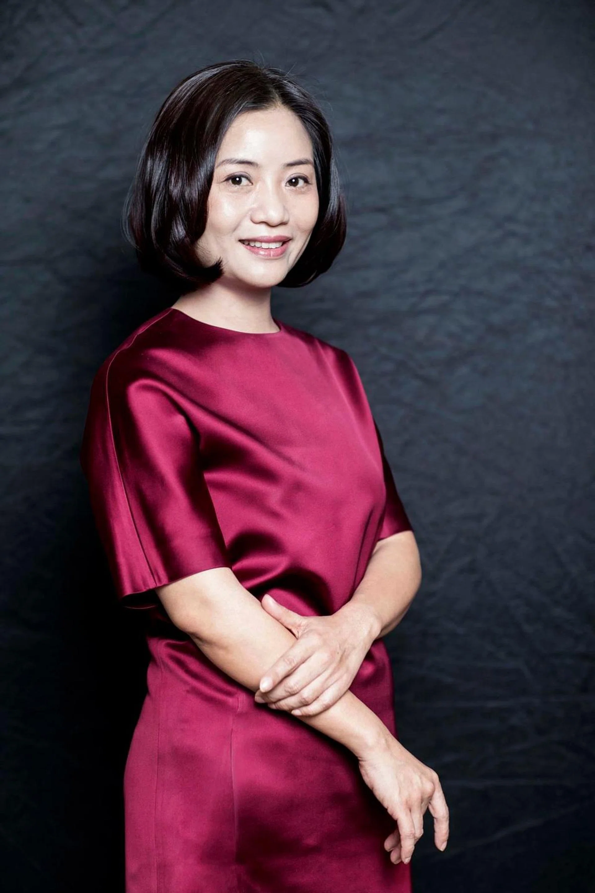 BEIJING, CHINA - DECEMBER 31:  Chinese designer Guo Pei, who is invited by the Chambre Syndicae de la Haute Couture for the Paris Haute Couture Shows between January 24th to 29th, 2016, poses during a photo shoot on December 31, 2015 in Beijing, China.  (Photo by Lintao Zhang/Getty Images) *** Local Caption *** Guo Pei
